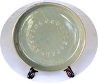 Click the image for a view of: fruitleafalgaestone. 2014. Celadon glazed ceramic plate. Edition 20